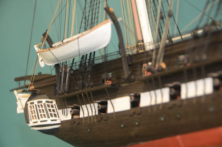 The quarter boat on its davits, above the quarter gallery